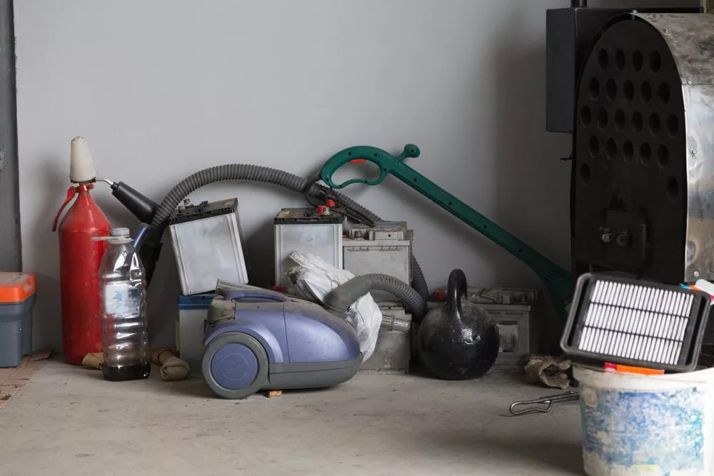 crew removing household junk from residential property in Edmonton